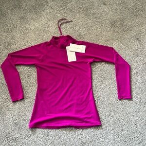 Rashguard zipper pull in back